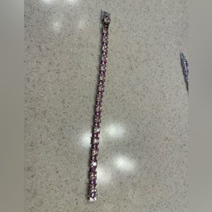 Sterling tennis bracelet with pink stones